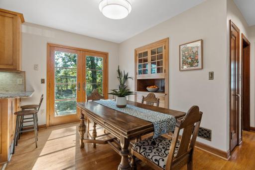 French doors open to the backyard, counter bar seating is great for entertaining