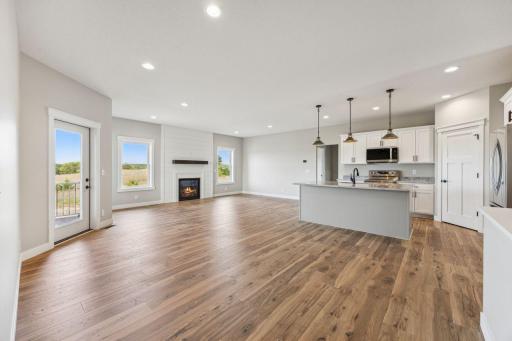 Current spec home has main level vaulted ceiling for an even more open feel - *This photo is of previous spec which did not have a vault*