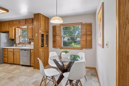 Informal dining area with window shutters