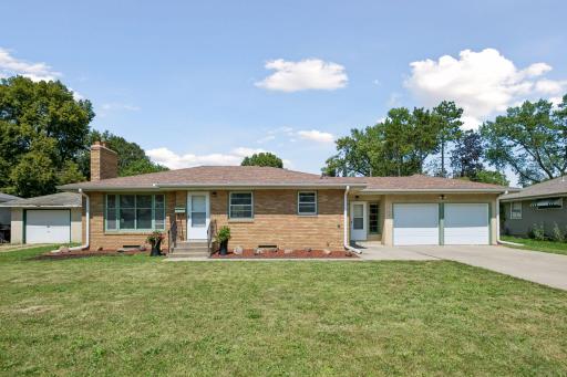 Front of home with brick exterior