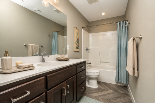 Lower Level Full Bathroom. *Photos have been virtually staged to showcase decor