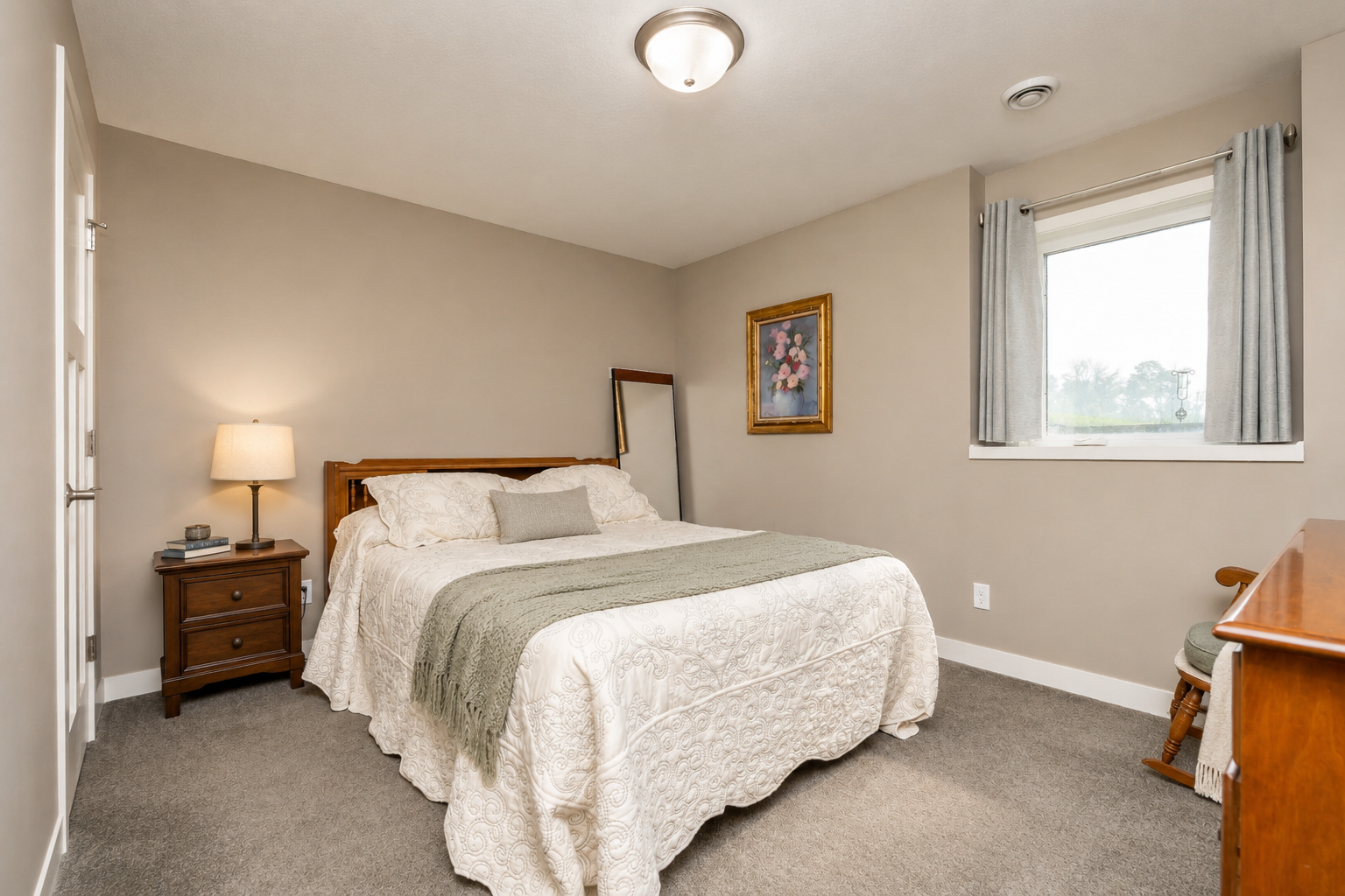 Lower Level Bedroom. *Photos have been virtually staged to showcase decor