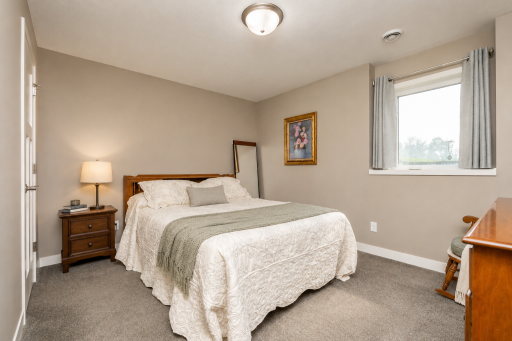 Lower Level Bedroom. *Photos have been virtually staged to showcase decor