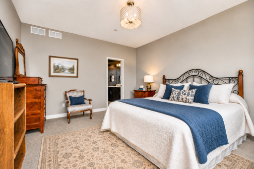 Primary Bedroom with Private Bathroom. *Photos have been virtually staged to showcase decor