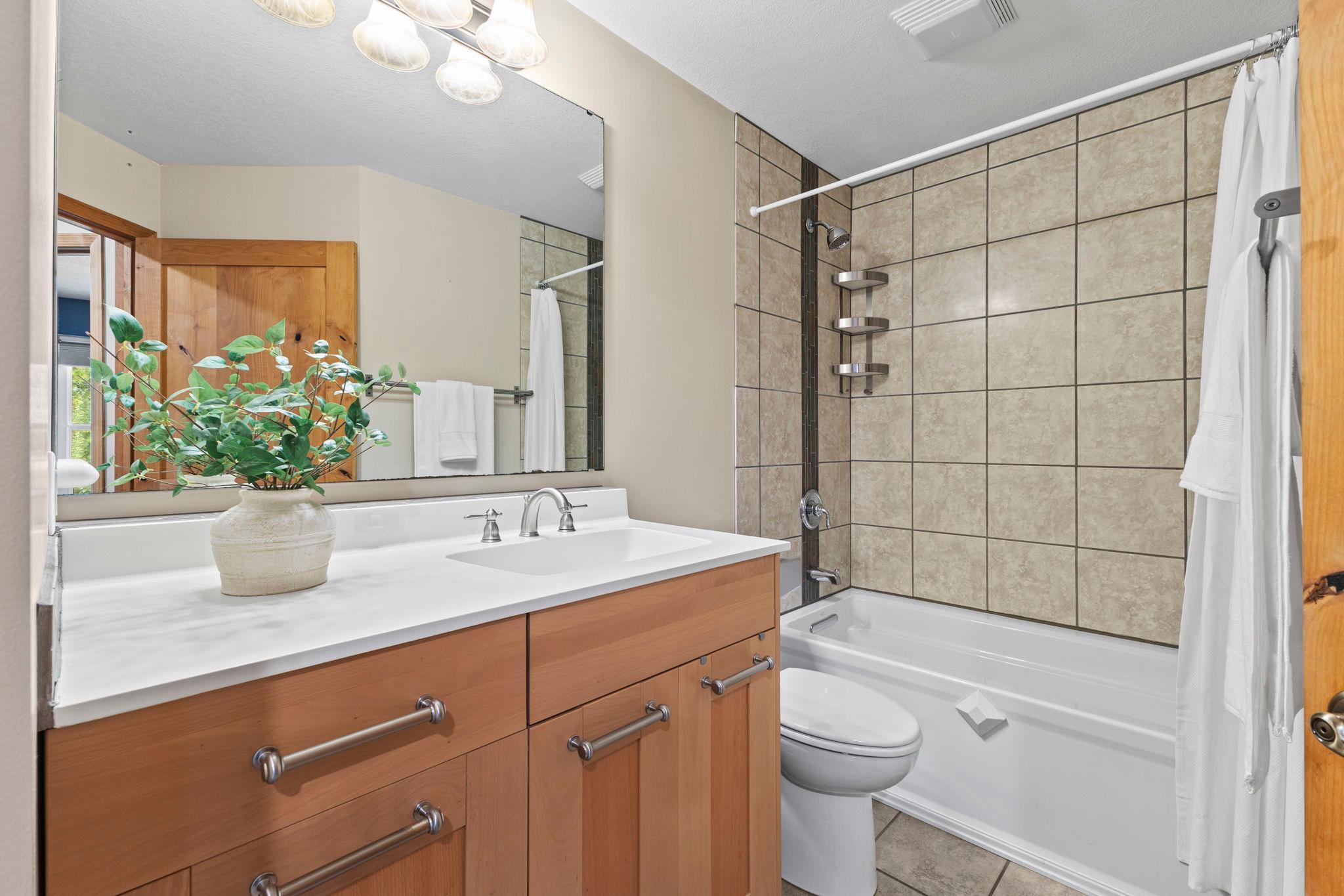Full bath just off the foyer on the main-level.