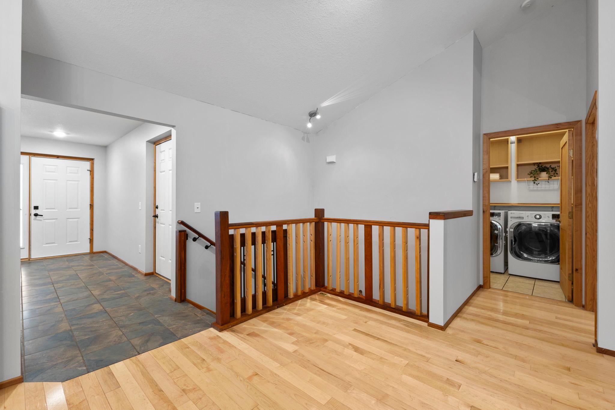 Steps away is your laundry room & primary suite!