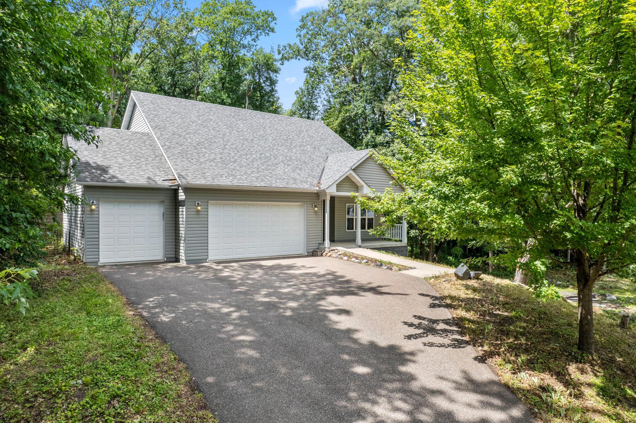 With a long and spacious driveway!