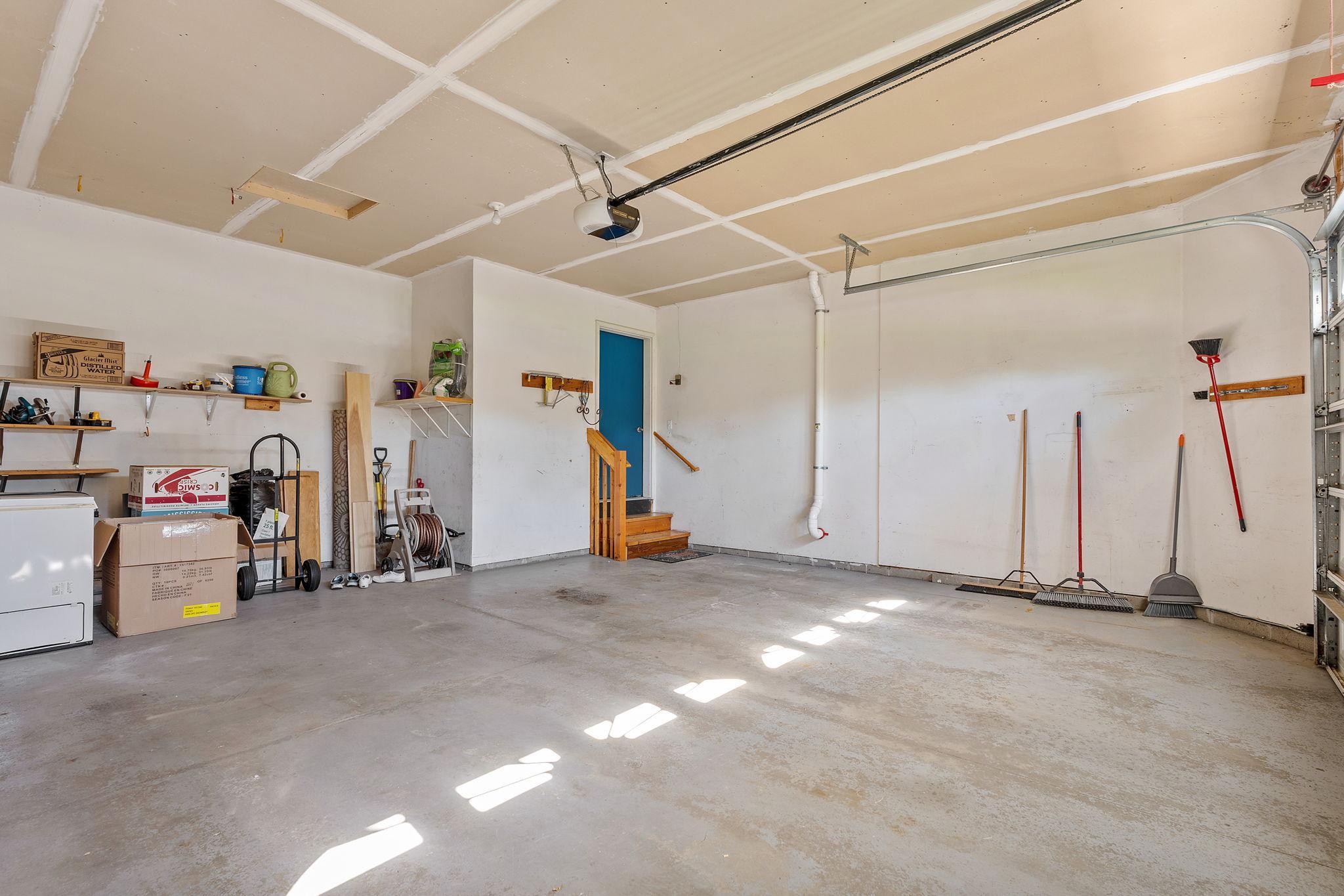 ...and an oversized two-stall garage with water faucet...