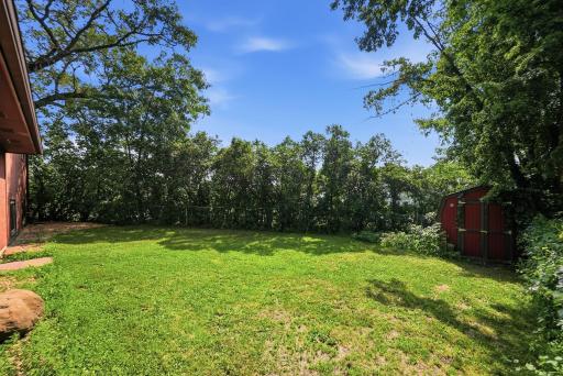 Framed by mature trees and lined with fragrant lilac bushes