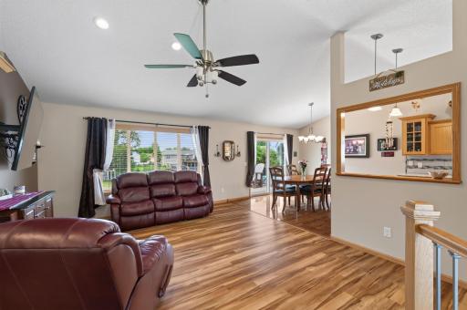 Natural light fills the main living area. This bright, open space feels warm, welcoming, and ready to make memories.