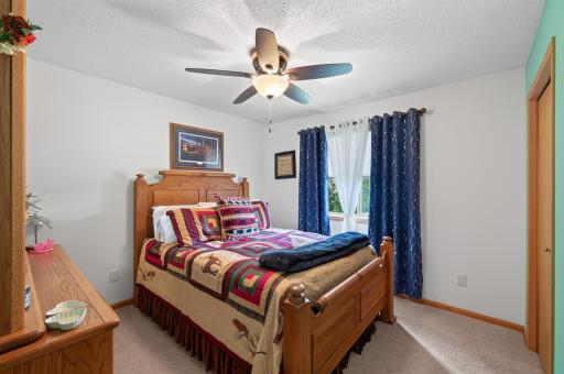 Another spacious bedroom provides flexibility for any lifestyle.