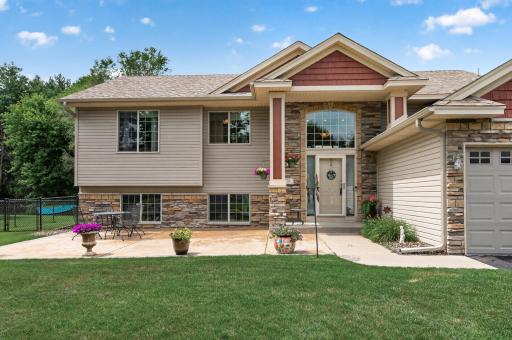 A grand front entry creates a warm first impression. The attractive stone accents and welcoming foyer set the tone from the moment you arrive.