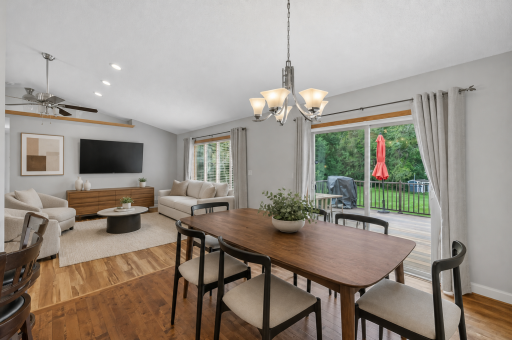 dining room and living room virtually staged and paint color changed using AI..png