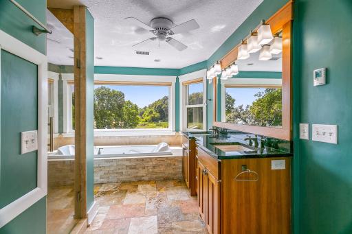 Primary Bedroom Attached Bathroom with Panoramic Water Views