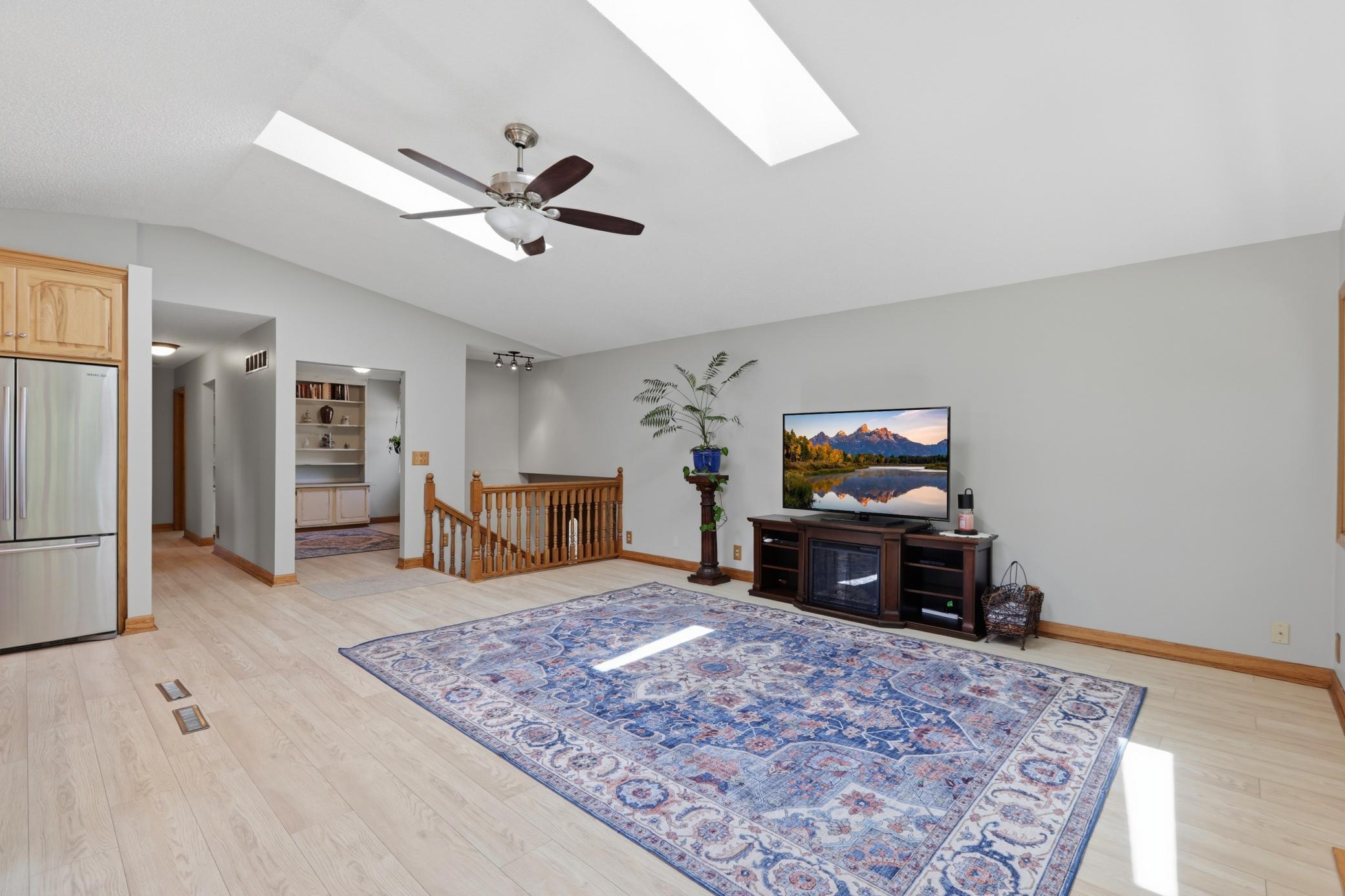 Bright Living Room w/ Vaulted Ceiling