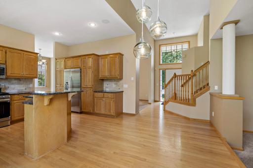 View into Informal Dining Area, Kitchen, and Foyer