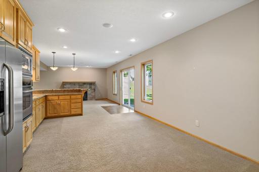 View into lower-level Rec Room with Kitchenette and Walk-out Patio