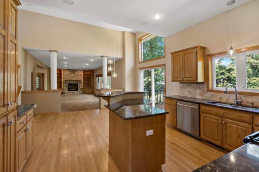View into Kitchen, Informal Dining Area, and Family Room