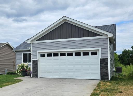 2 car attached garage w/upgraded Concrete Driveway