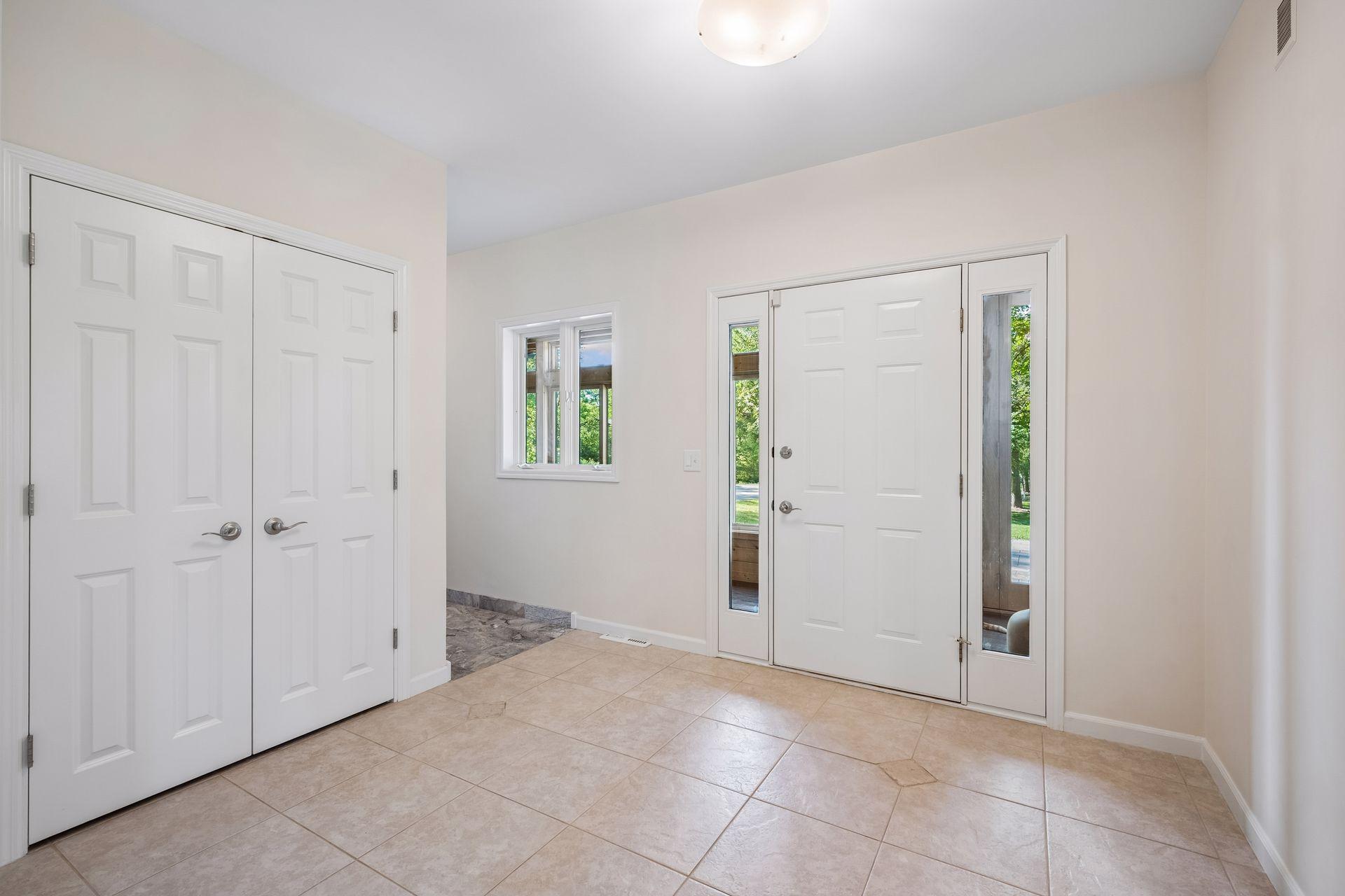 Bright and open foyer greets your guests