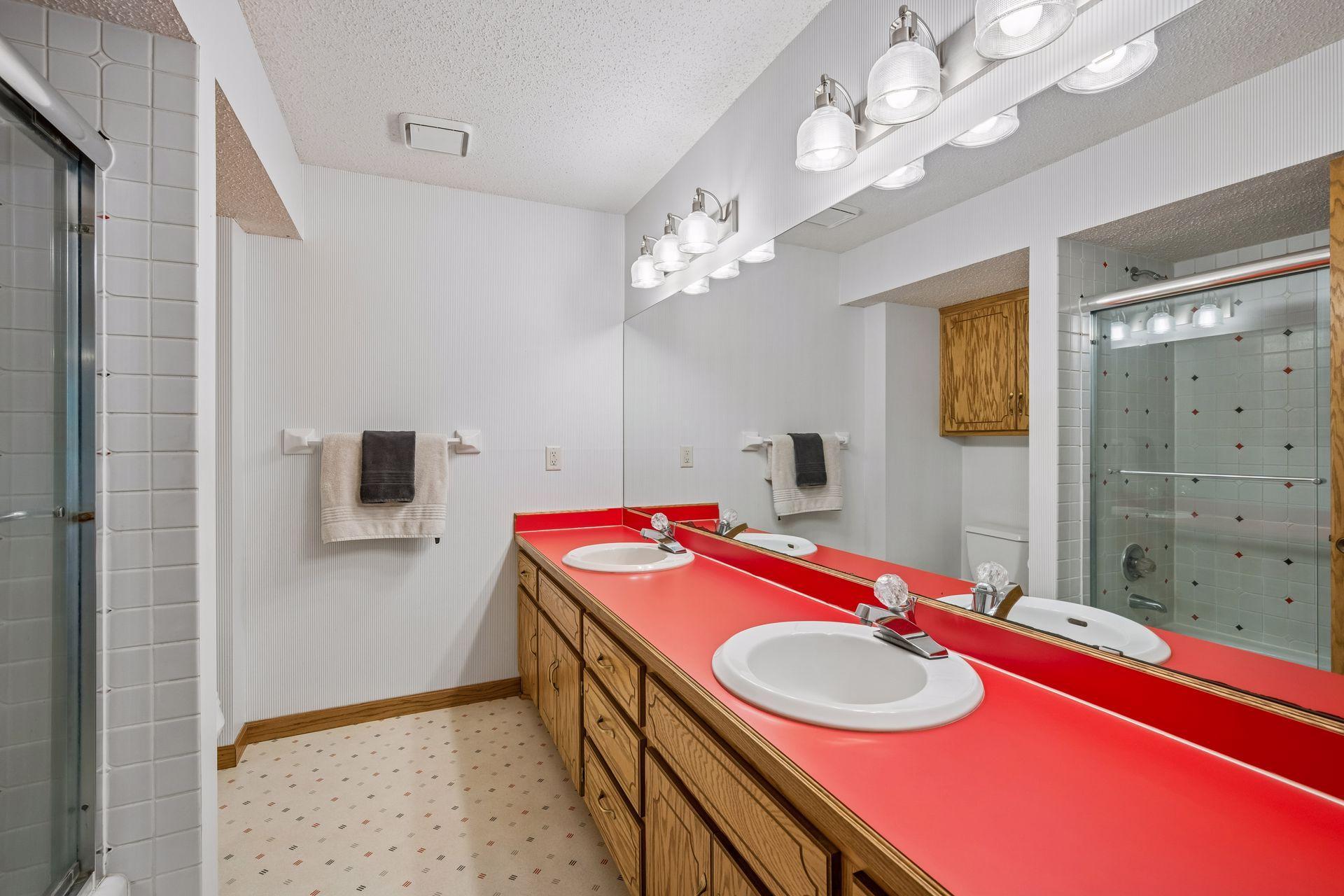 Lower level full bathroom, with vintage tiled shower and tub