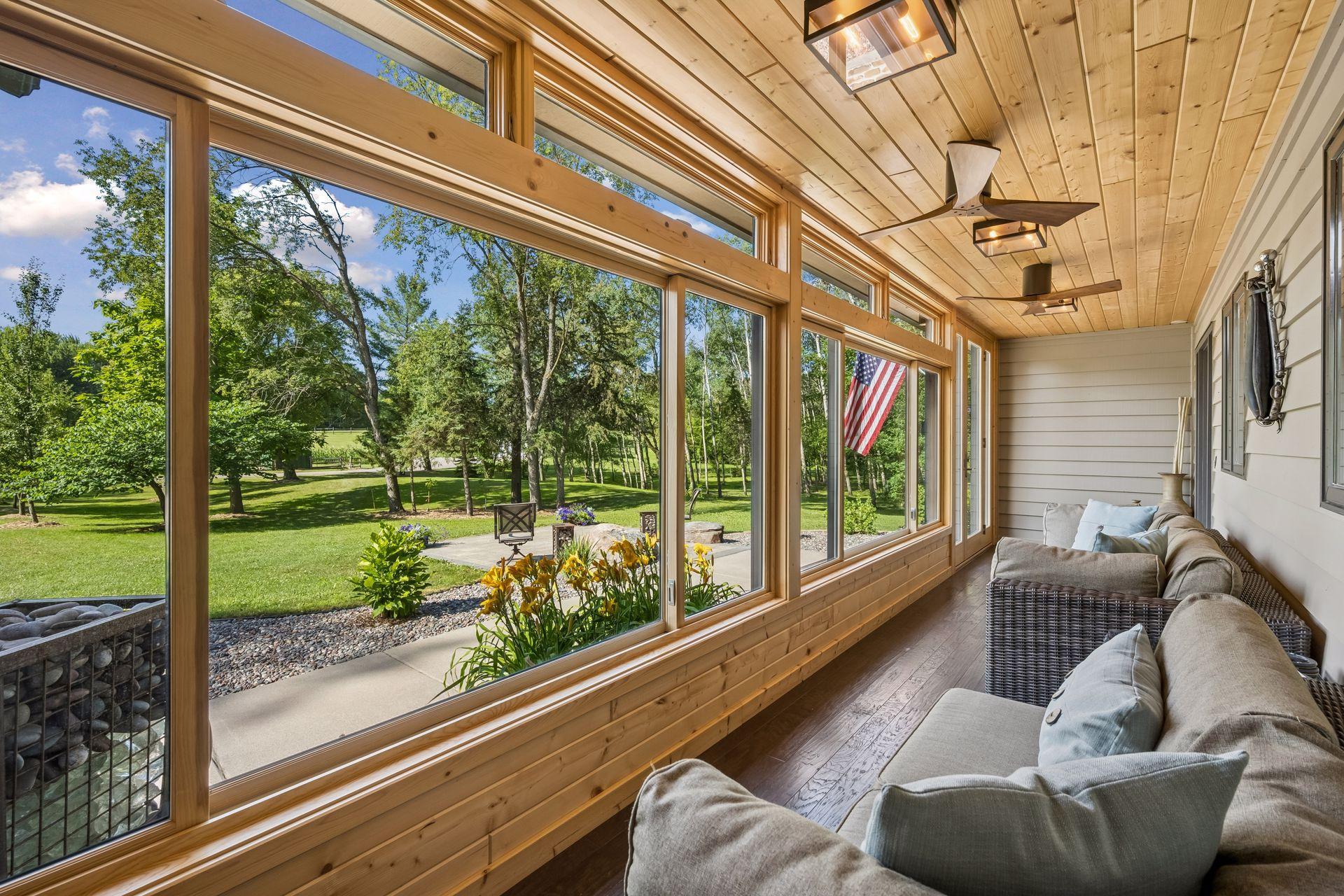 Bright and welcoming, this front sun porch is the best spot to start your morning
