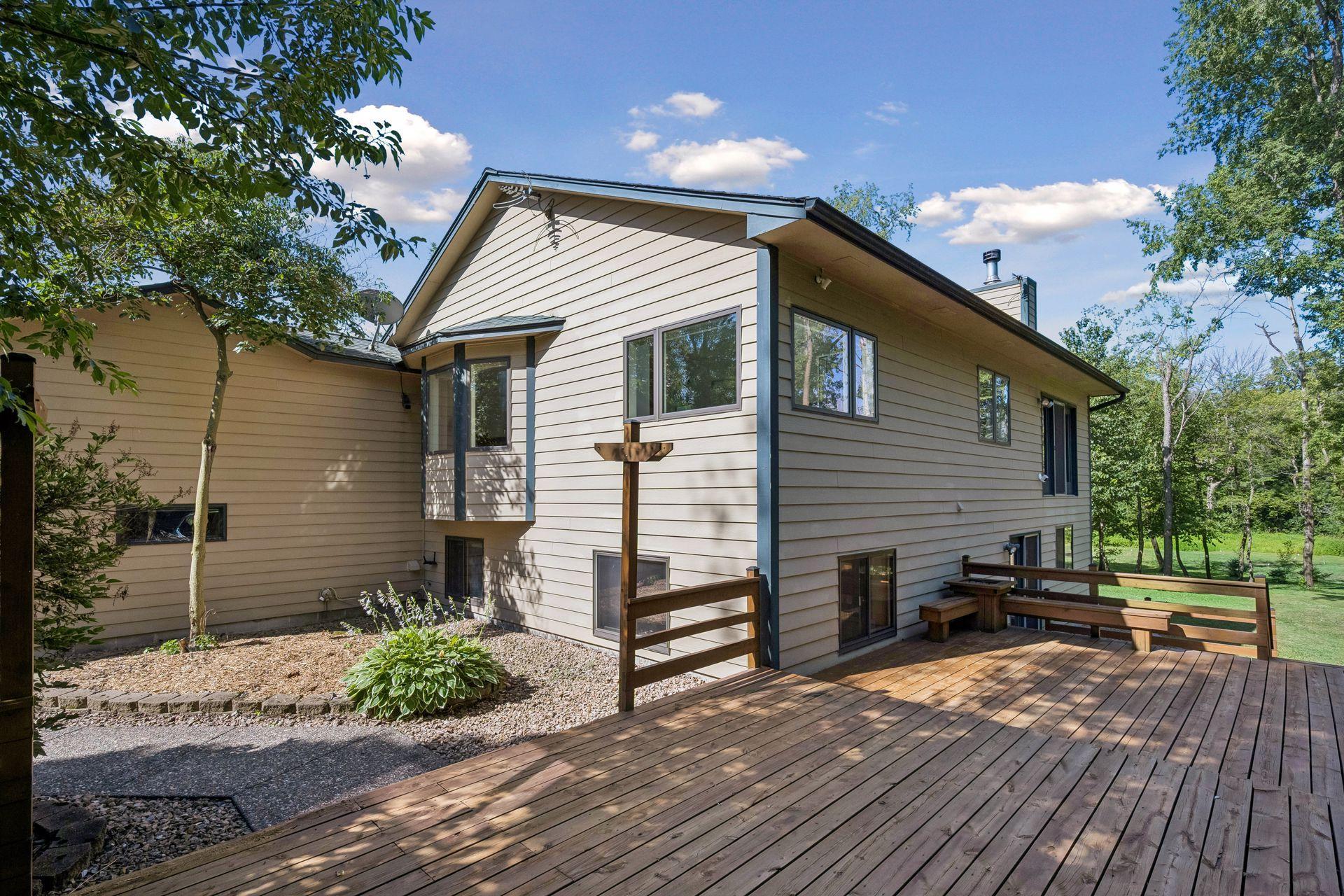 Outdoor relaxation at its finest - the expansive three-tier deck at the rear of the home offers incredible entertaining area