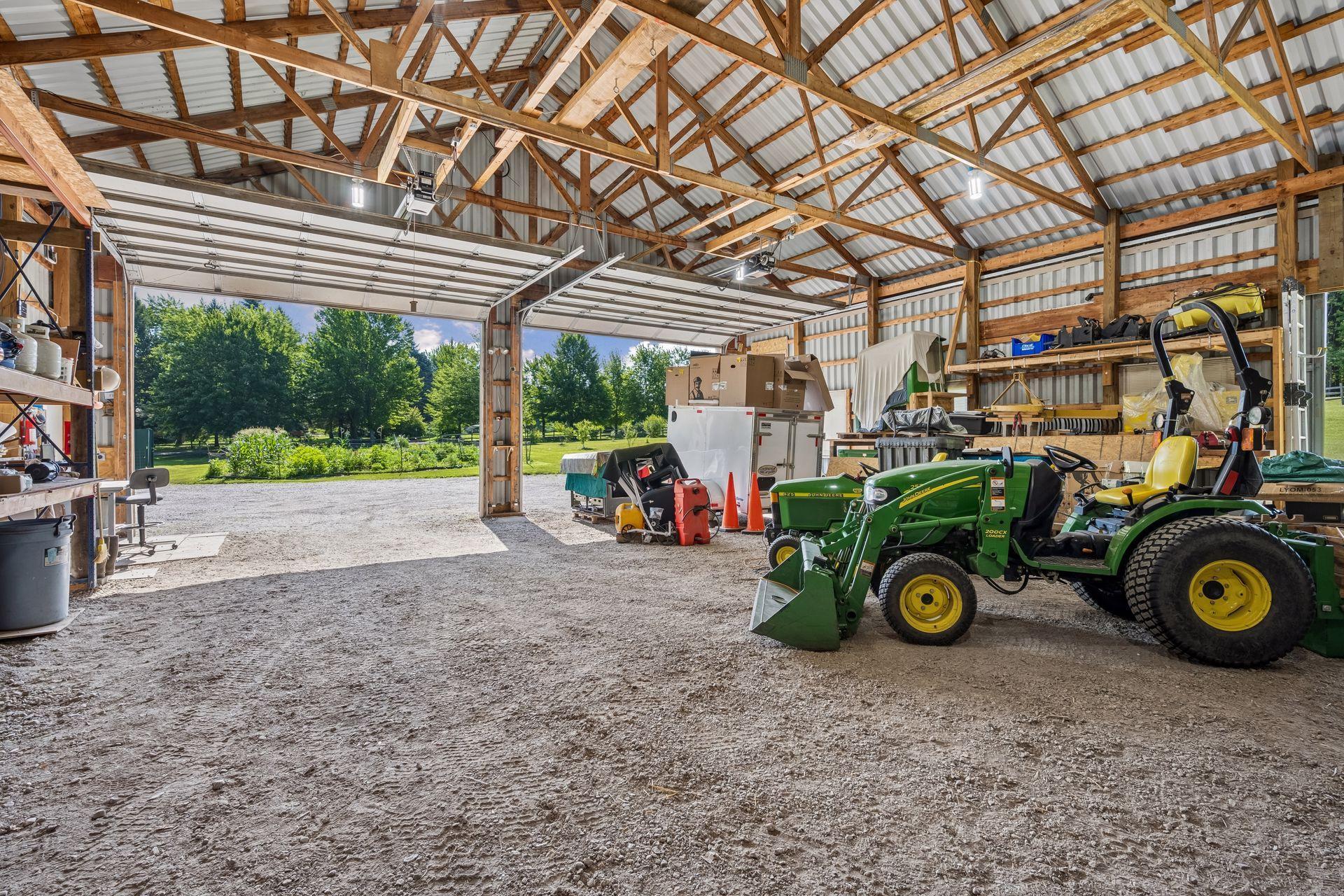 200-amp service, water hydrant, and Wifi installed. Double 16'x12' insulated overhead doors with commercial openers make storing equipment, RVs, and more a breeze, plus large sliding door on the south side allows for access for equipment or animals.