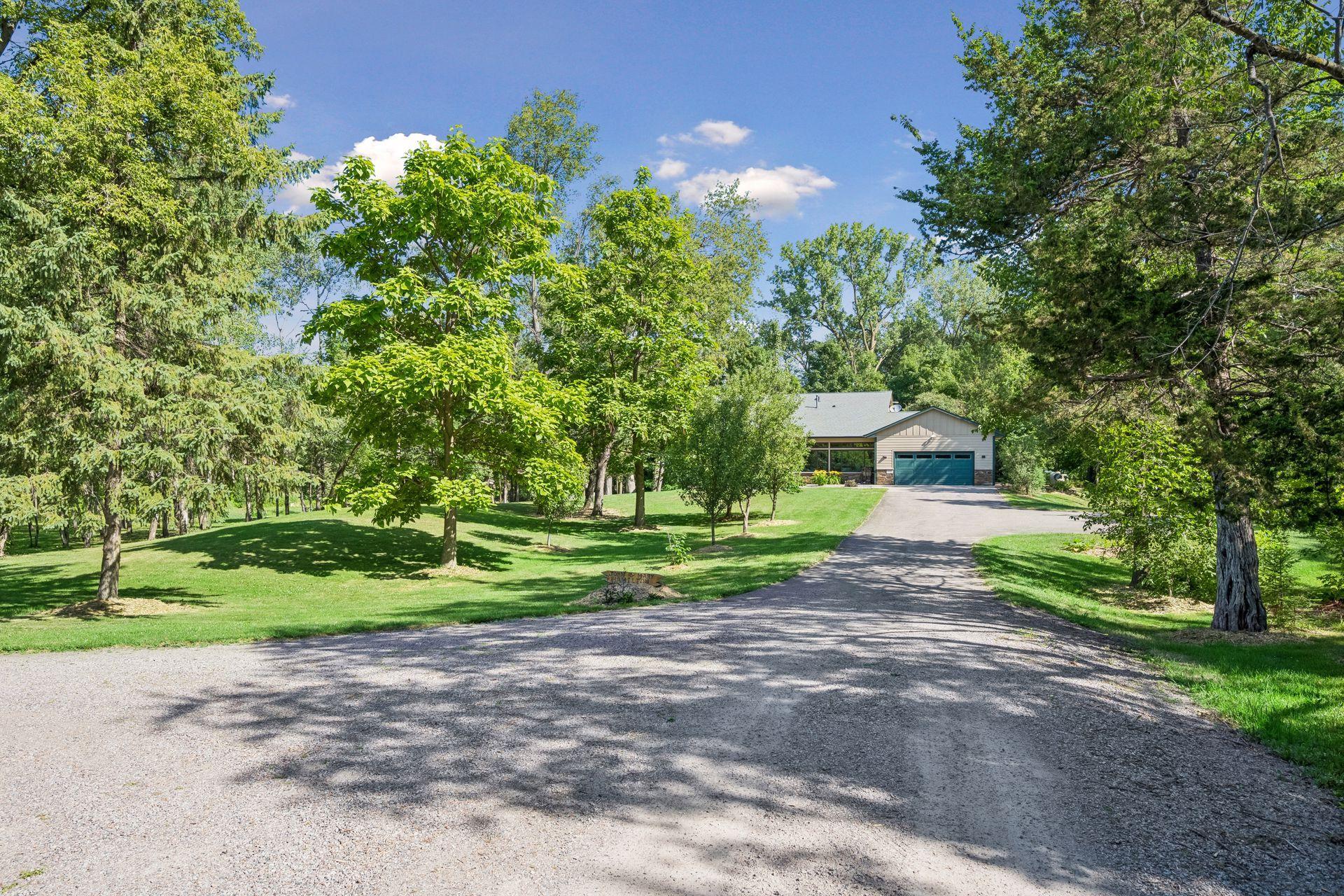 Driveways are well maintained granite and asphalt, with great access to the outbuilding and parking