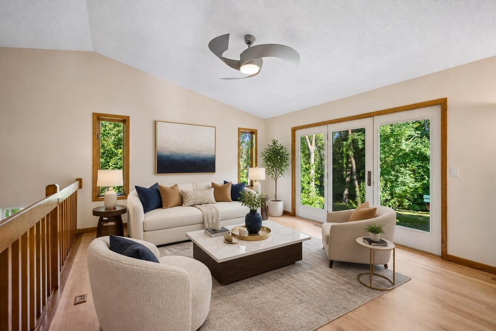 Upper level living room, shown virtually staged
