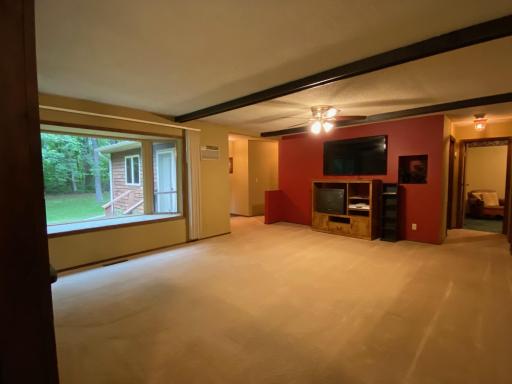 Another view of the living area which has a large bay window