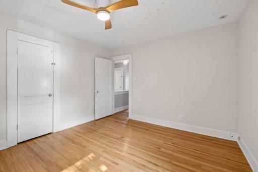 Another view of the bright upper-level bedroom.
