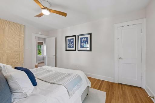 bedroom offers generous space and easy access to the upper-level bedrooms and bath.