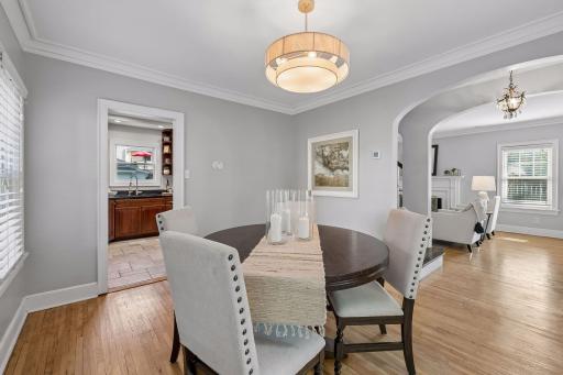 Dedicated dining room conveniently positioned between the living room and kitchen.