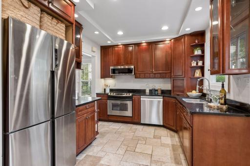 Well-appointed kitchen with stainless appliances and excellent cabinet storage.