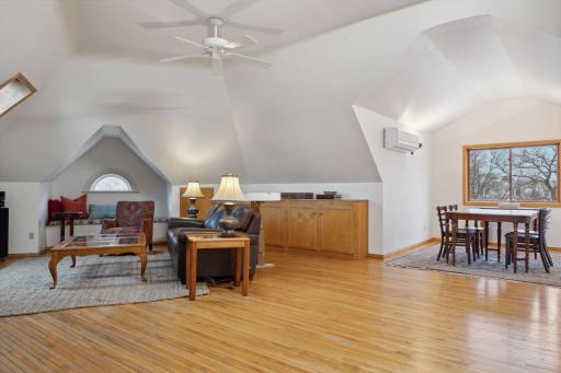 Third-floor bonus space - family room, dining, kitchen, office space, bedroom and bathroom.