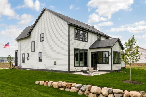 Rear Elevation with 4-Season Porch and Patio