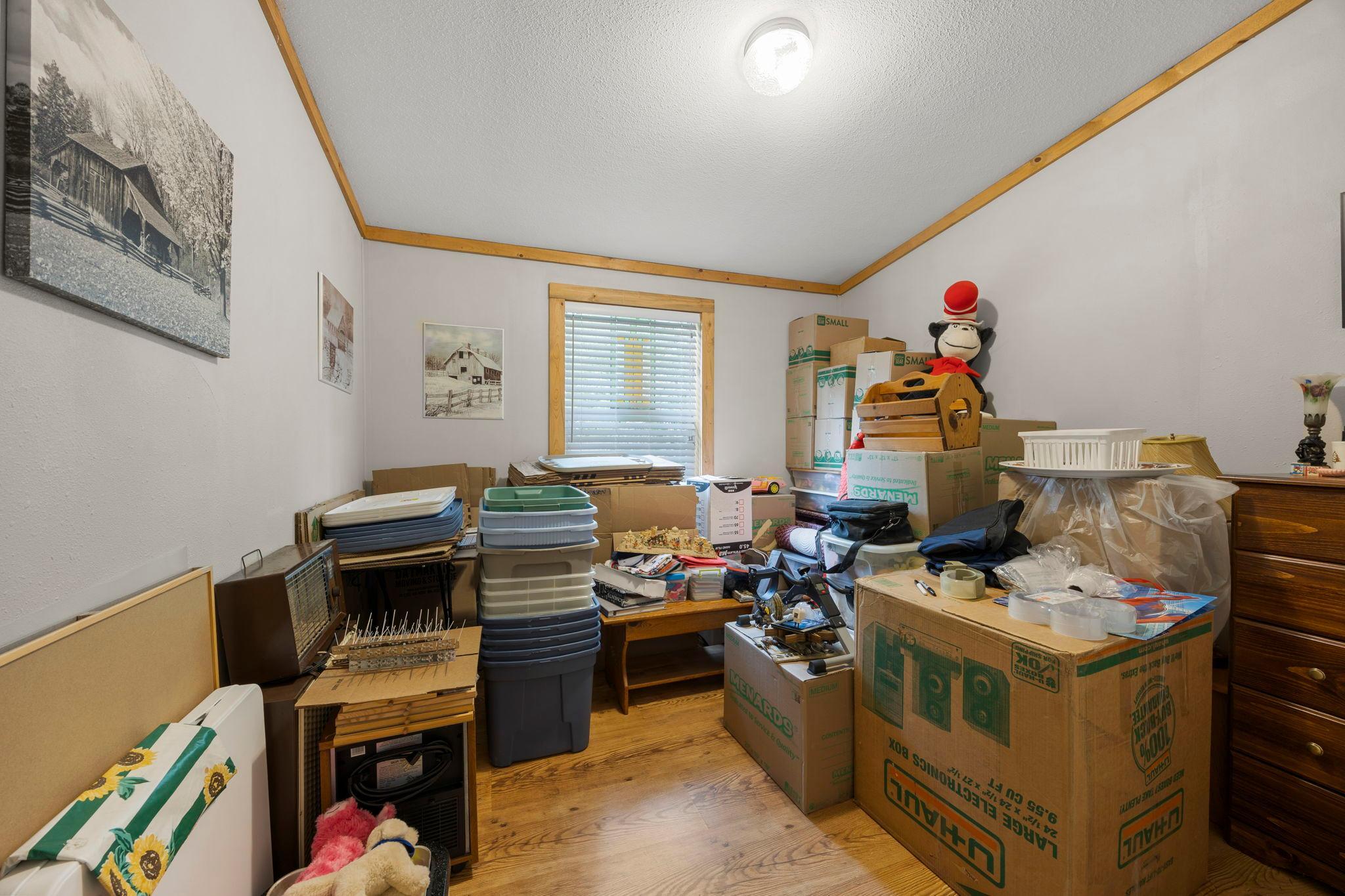The third bedroom is currently used for storage.
