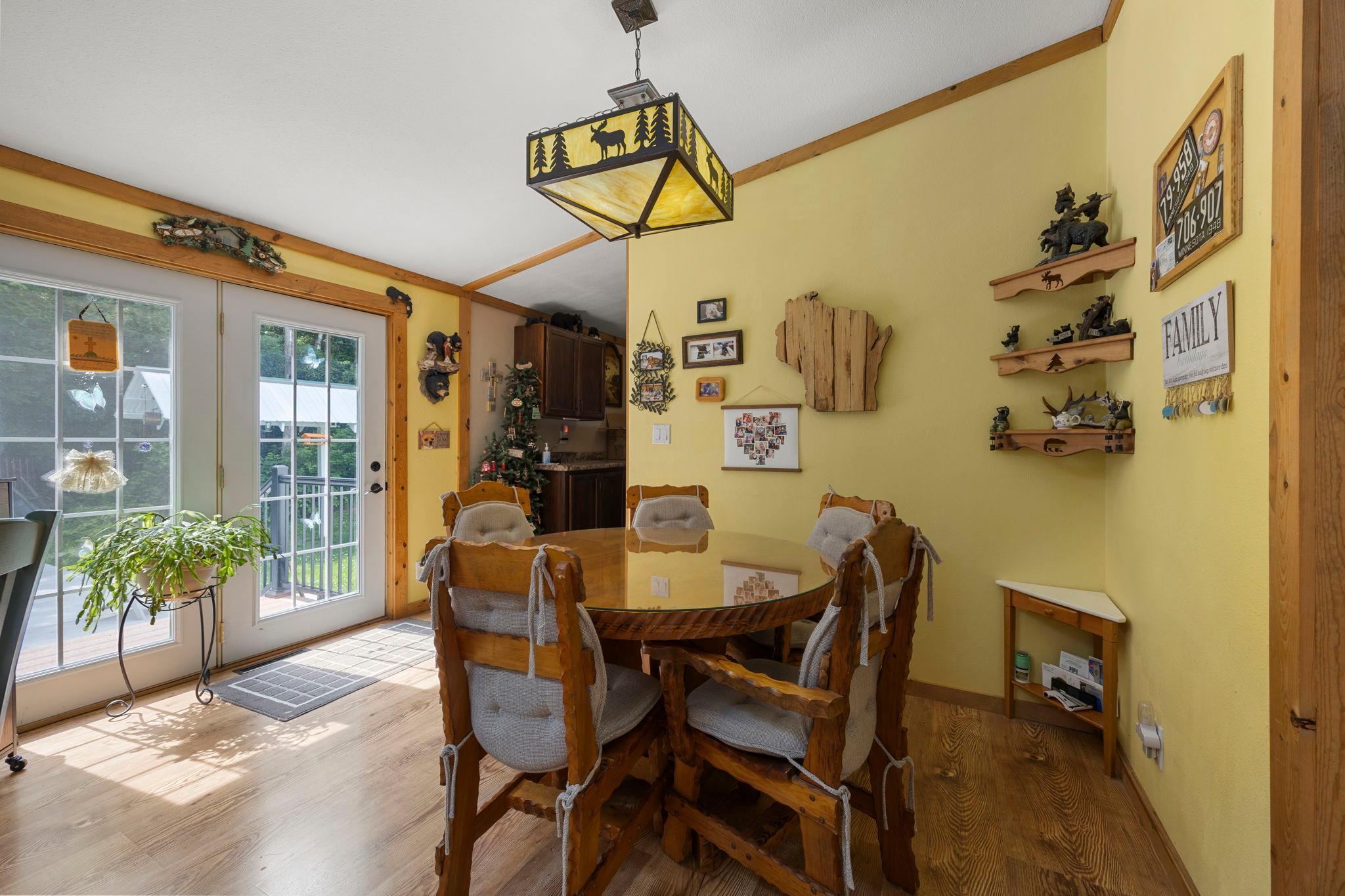 The dining area has plenty of space for table expansion to entertain guests.