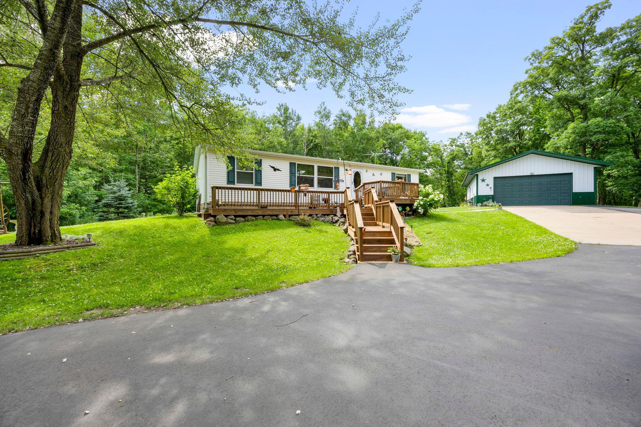 Built on a concrete slab with an easy access full crawlspace. Includes a new deck, beautiful patio, finished 24x40 garage & an additional 30x45 pole building.