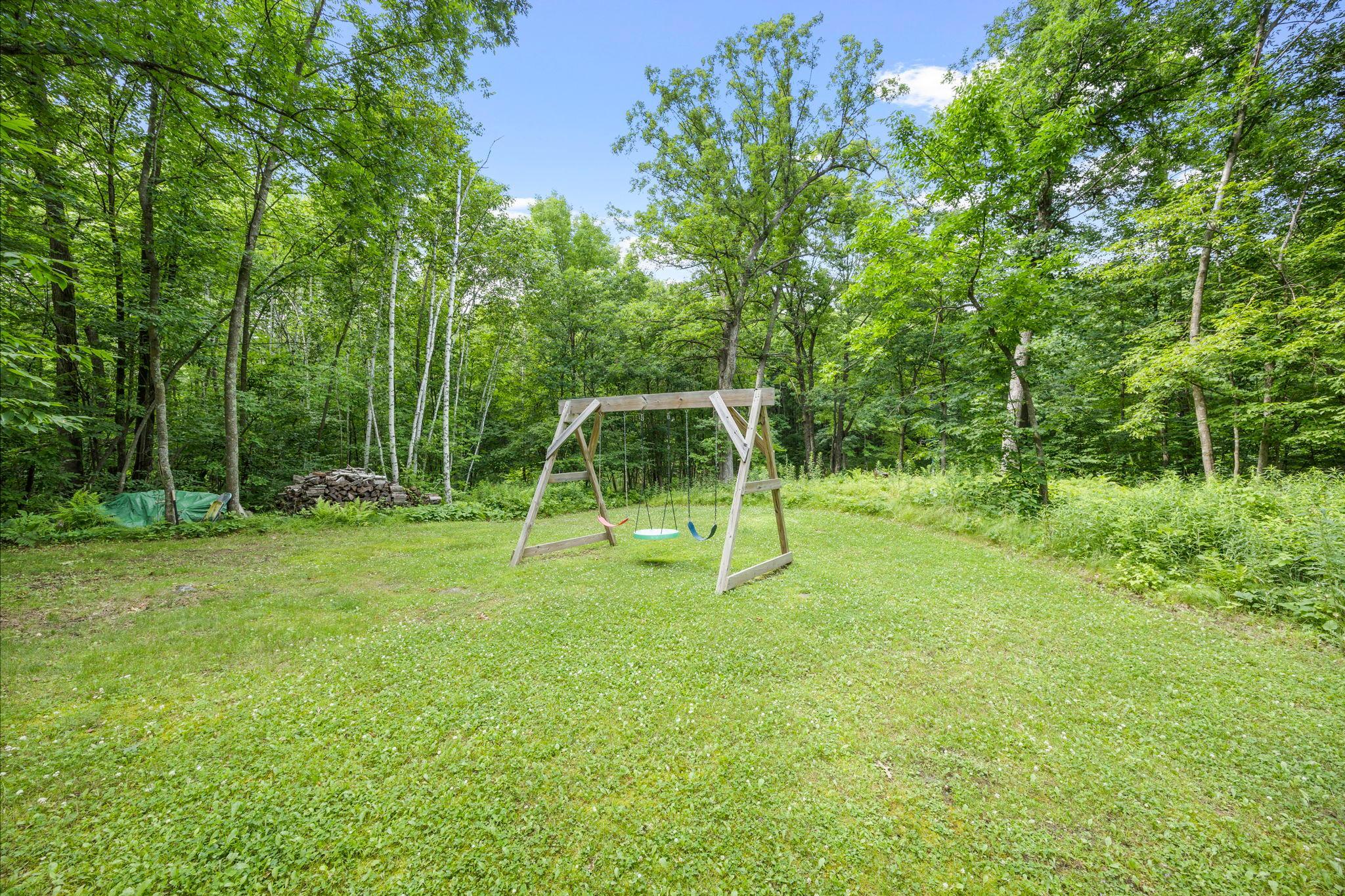 Keep the kiddos happy, the swingset is included.
