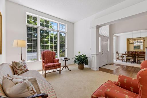 Light-Filled Living. The spacious main-level living room offers a welcoming place to relax, with generous windows bringing natural light into the space.