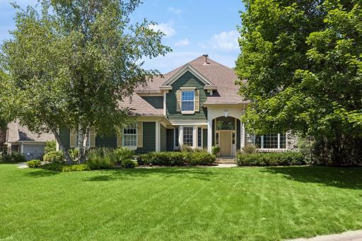 Timeless Curb Appeal
A beautifully maintained stone-and-cedar exterior, manicured landscaping, and a quiet cul-de-sac setting create a welcoming first impression.