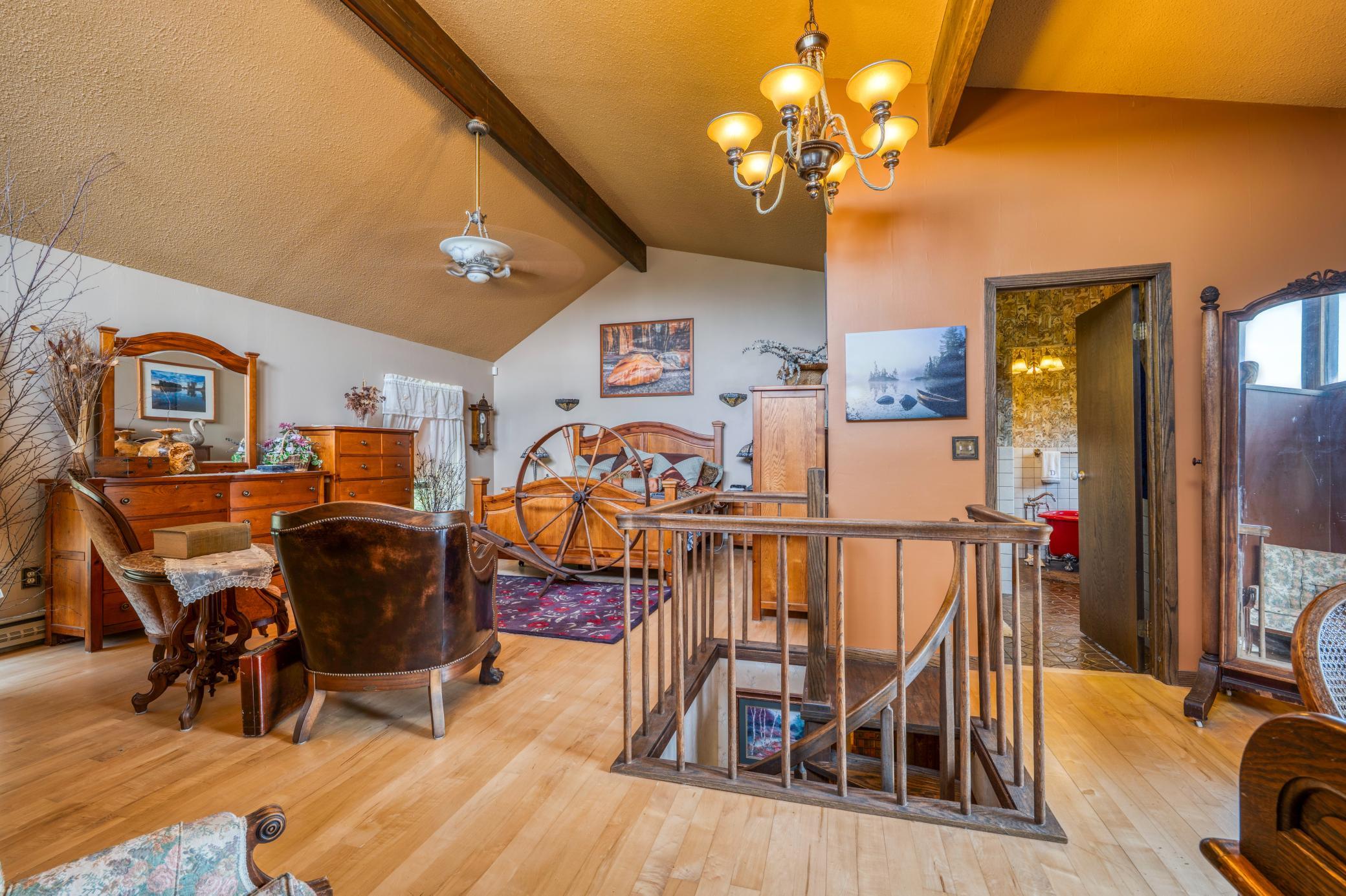 Owner's suite and ensuite bathroom, spiral staircase