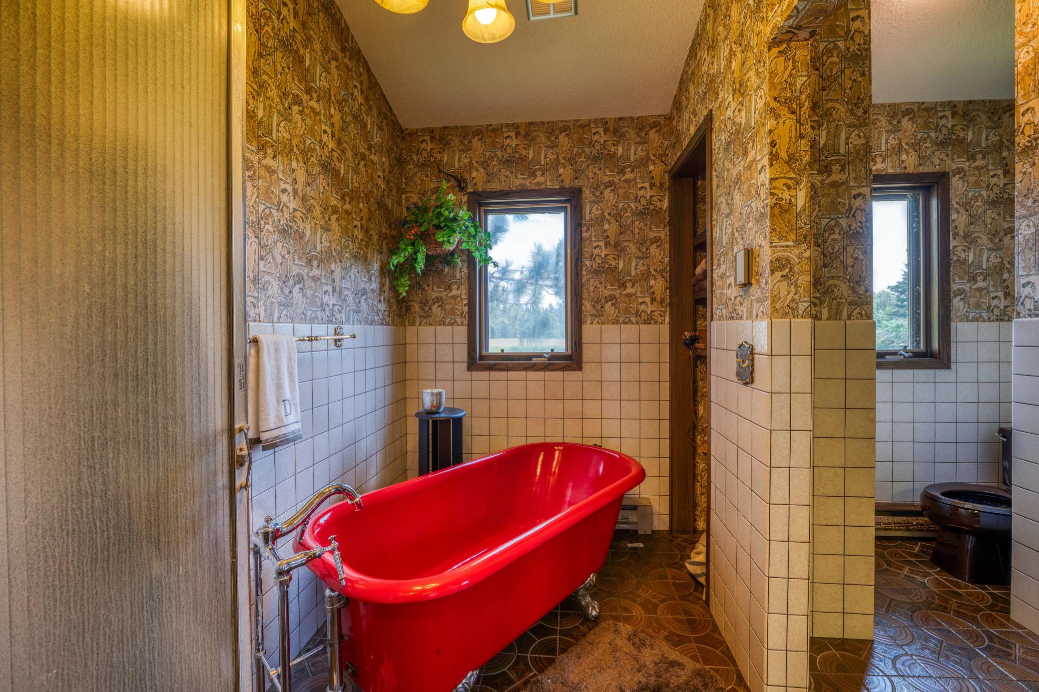Owner's suite cast footed tub