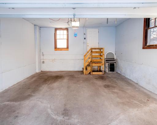 Solid two car garage with electricity to garage accommodate 110V--EV charging station if desired