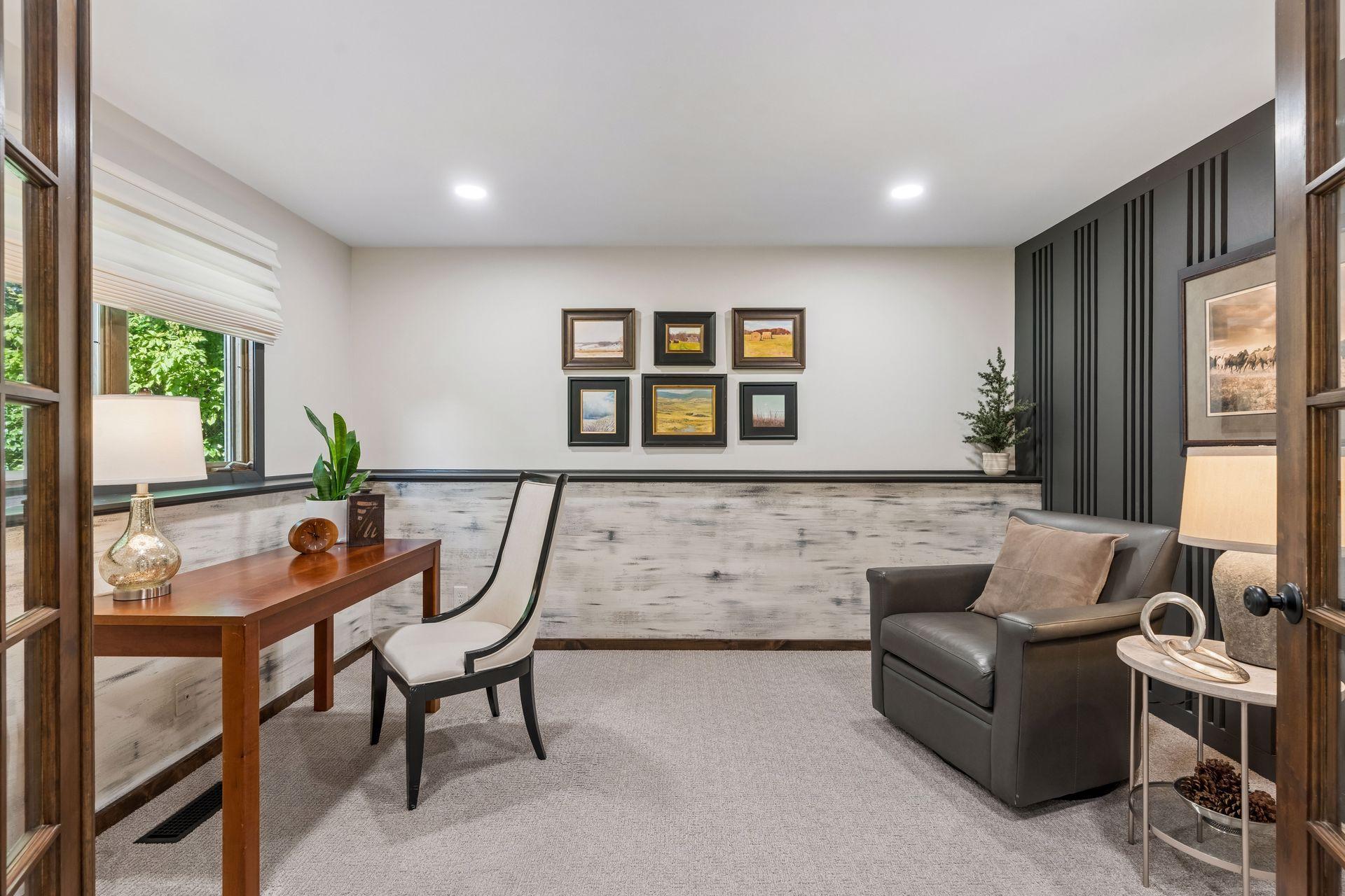 Office in lower level with wood accent wall