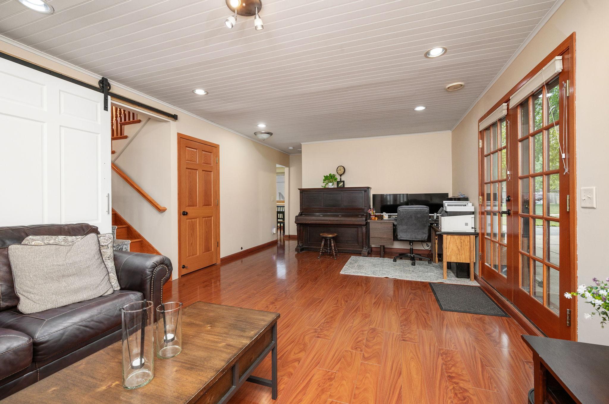 Additional lower-level living space, ideal for a flex room, home gym, or recreation area