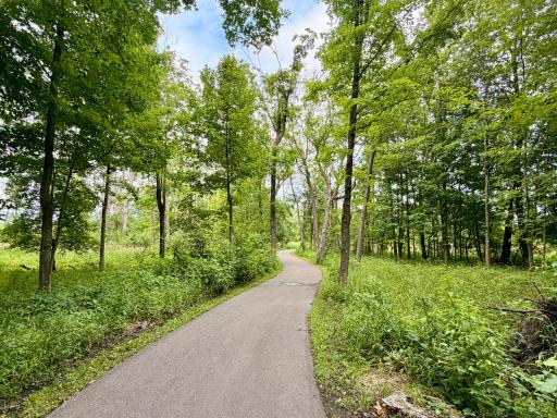 Miles of scenic trails connect Woodland Cove directly to Carver Park Reserve and Lowry Nature Center.
