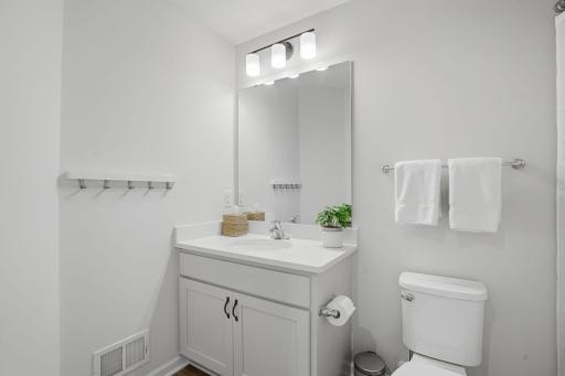 The upper-level full bath is thoughtfully designed with timeless finishes.